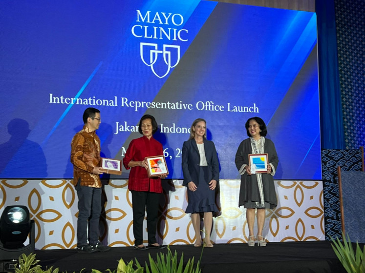 Mayo Clinic infectious diseases physician and executive medical director of the Asia-Pacific region Stacey Rizza (second from right) and Santini Group's Riantini Sutedja pose during the opening of Mayo Clinic's International Representative Office in Jakarta on March 16, 2023.