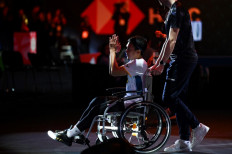 Ahsan wheeled off All England court but not without one last touch