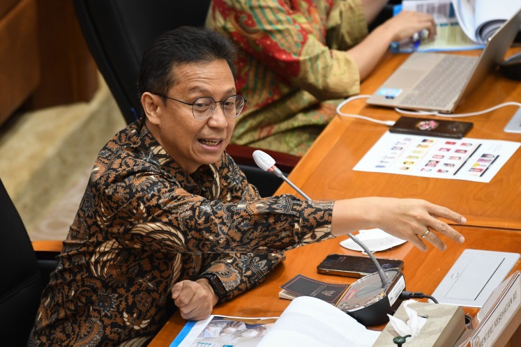 Health Minister Budi Gunadi Sadikin gestures as he speaks during a hearing with House of Representatives Commission IX in Senayan, Jakarta, on March 28, 2023. The meeting focused on the health digital transformation strategy and revitalization of primary health service starting from posyandu (community health centers).