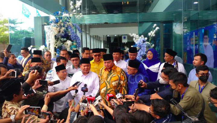 Gerindra chairman Prabowo Subianto speaks to reporters on April 2, 2023, joined by leaders of other political parties including Golkar chairman Airlangga Hartarto.