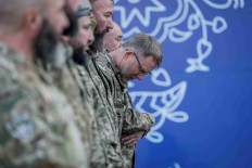 Said Ismahilov, the military paramedic and ex-mufti of Ukrainian Muslims, who became honored with the Order of Merit by Ukrainian President Volodymyr Zelensky, attends an Iftar where Zelensky share a meal with Ukrainian Muslim soldiers, breaking their fast, during the holy fasting month of Ramadan, near a mosque in the outskirts of Kyiv, Ukraine, April 7, 2023.
