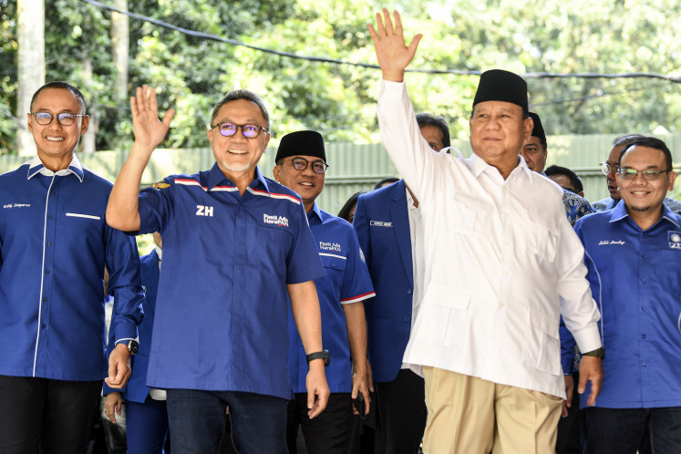 Gerindra Party chairman Prabowo Subianto (right, foreground) walks with National Mandate Party (PAN) chairman Zulkifli Hasan (left, foreground) on April 8, 2023 before a meeting at Prabowo's private residence on Jl. Kertanegara in Kebayoran Baru, South Jakarta. Zulkifli’s visit aimed to strengthen the bond between the two political parties and to explore the possibility of forming an alliance to contest the 2024 general election.