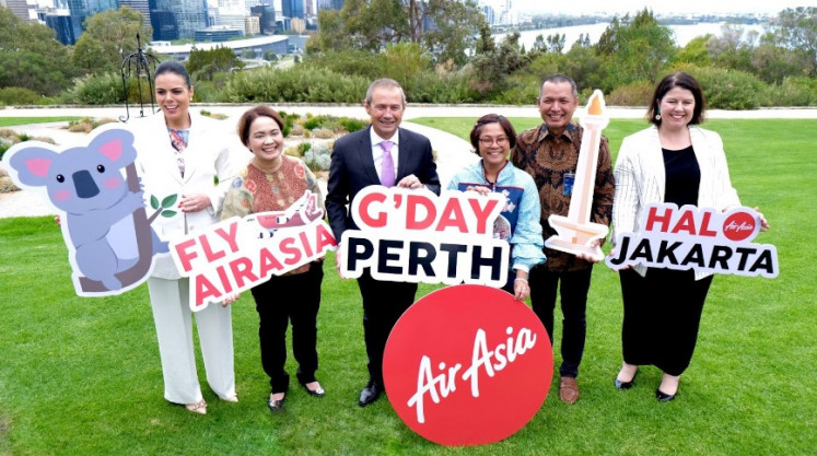 Going to Perth: Tourism Western Australia managing director Carolyn Turnbull (left to right), Indonesia AirAsia CEO Veranita Yosephine, West Australia deputy premier and tourism minister Roger Cook, Indonesian Consul General in Perth Listiana Operananta, state-owned airport operator PT Angkas Pura II commercial and services director Mohammad Rizal Pahlevi and Perth Airport acting CEO Kate Holsgrove pose during a ceremony announcing the inaugural Jakarta-Perth route at the King’s Park Botanical Garden in Perth, Australia, on March 30, 2023. The low-cost airline will serve a direct flight between Jakarta and Perth four times a week starting from June 1, 2023. 