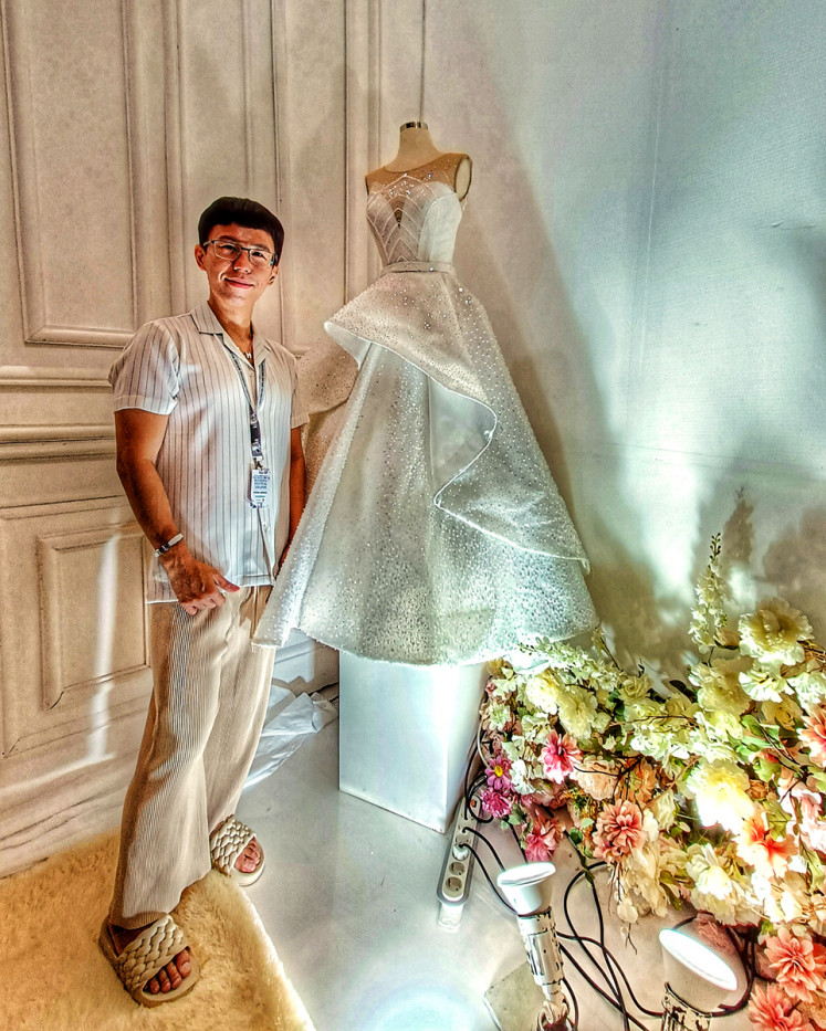 Beautiful: Petrick Sutrisno showcasing his semi-ball gown wedding dress made of crinoline and silk. (JP/Sylviana Hamdani)