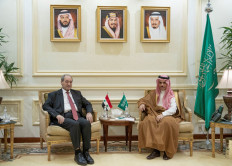 Saudi Foreign Minister Prince Faisal bin Farhan bin Abdullah (right) meets with Syrian Minister of Foreign Affairs and Expatriates Faisal Mekdad in Jeddah, Saudi Arabia, on April 12, 2023. 