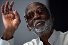  In this file photo taken on August 3, 2016 US jazz pianist and composer Ahmad Jamal (born Frederick Russell Jones) speaks during the Marciac Jazz Festival in Marciac. Ahmad Jamal, a towering and influential jazz pianist, composer and band leader in a career spanning more than seven decades, has died at age 92, news reports said Sunday.
