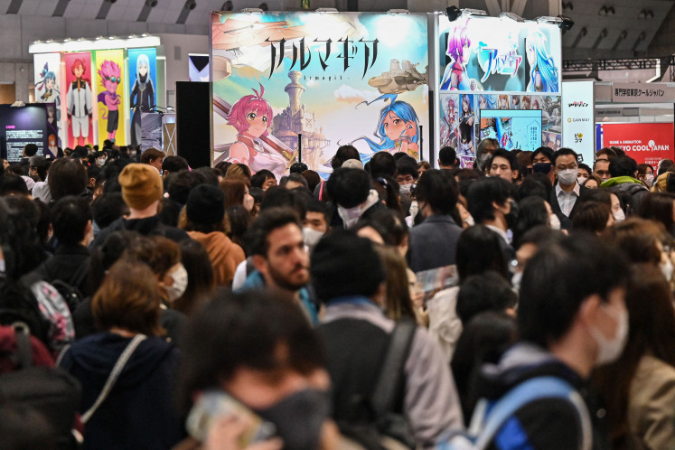 This photo taken on March 25, 2023 shows people attending the 10th Anime Japan, the Japanese animation industry's biggest event, at Tokyo Big Sight in Tokyo.
