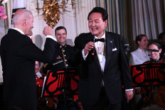'I had no damn idea you could sing': Yoon's 'American Pie' stuns Biden