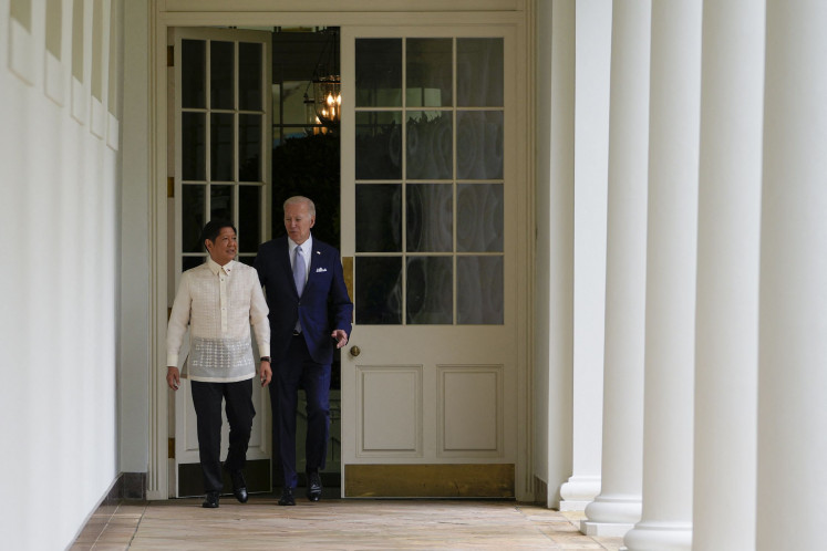Philippine President Ferdinand Marcos Jr. and United States President Joe Biden walk up the West Wing colonnade on their way to the Oval Office at the White House in Washington, DC, on May 1, 2023.