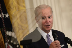 United States President Joe Biden speaks on May 1, 2023, during a reception celebrating Eid al-Fitr, marking the end of the Muslim fasting month of Ramadan, in the East Room of the White House in Washington, DC.