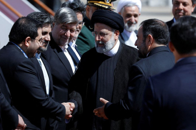 Iranian President Ebrahim Raisi is welcomed upon his arrival at Damascus airport in Syria on May 3, 2023.