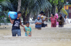 18 dead, 5 missing after Indonesia floods, landslide