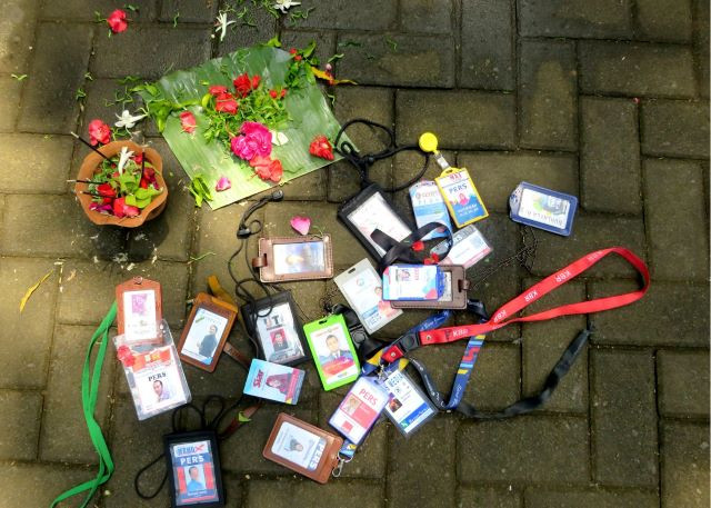 Say it with flowers, cards: Pressed-flower cards belonging to journalists in Malang, East Java, lie on the floor along with flower offerings during a ritual to mark World Press Freedom Day at the city’s square on May 3, 2023. During the event, the journalists expressed their concern about the rampant violence they faced.