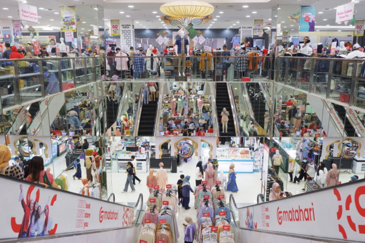 People shop at a mall in Serang, Banten, on April 9, 2023.