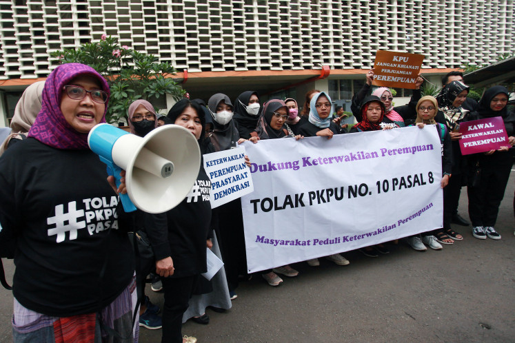 Vital voices: Protesters belonging to the Society Concerned About Women's Representation carry a banner calling for greater representation of women in the legislature during a rally on April 8, 2023, in front of the Elections Supervisory Agency (Bawaslu) in Jakarta.