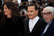 Johnny Depp receives warm welcome as comeback film opens Cannes