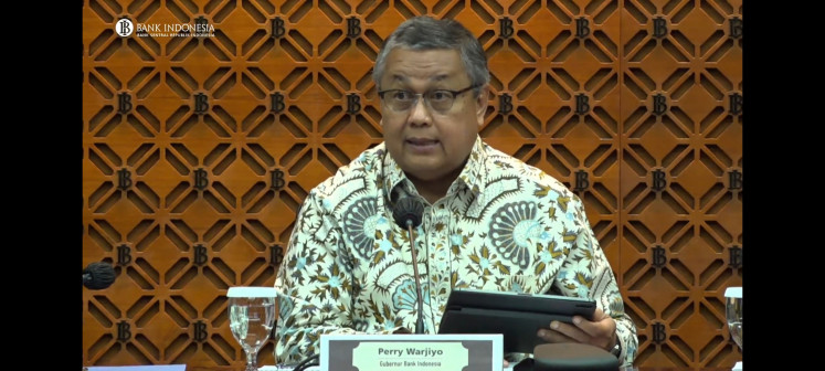 Bank Indonesia Governor Perry Warjiyo answers questions from journalists following the central bank’s monthly monetary policy meeting in Jakarta on May 25, 2023.