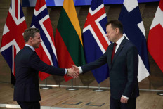 Poland's Defence Minister Mariusz Blaszczak welcomes Swedish Defence Minister Pal Jonson during meeting of Ministers from the 'Northern Group’, comprising 11 NATO countries and Sweden, in Legionowo, Poland, May 22, 2023. 