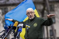 Ukrainian Defence Minister Oleksii Reznikov gestures as he talks to media during an Ukraine Defence Contact Group meeting at Ramstein Air Base, southwestern Germany, on April 21, 2023.