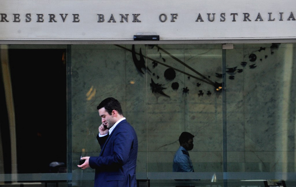 A man walks past the Reserve Bank of Australia in the central business district of Sydney on June 7, 2022.