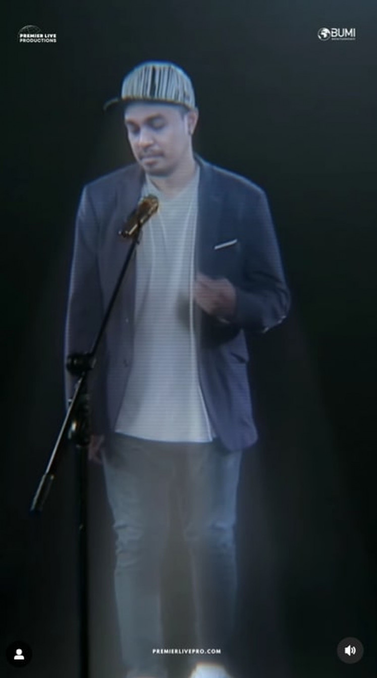 Back to 'live': The late R&B singer Glenn Fredly is shown in a video trailer for his upcoming hologram concert 'Glenn Fredly: 25 Years of Music' on June 24, 2023, in Ancol, Jakarta. 