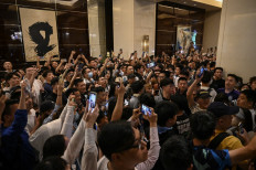 Chinese fans wait for members of Argentina's football team in the lobby of a hotel where the team is staying in Beijing on June 10, 2023. Argentina will play a friendly football match against Australia on June 15 at Beijing's newly-renovated 68,000-capacity Workers' Stadium.

