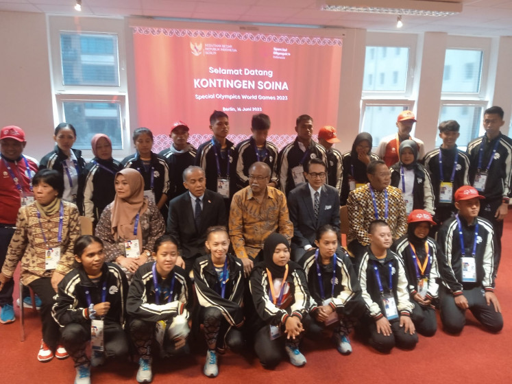 Indonesian Special Olympics athletes and officials take a group photo during an event at the Indonesian Embassy in Berlin on June 16, 2023, before they participate in the Special Olympics World Games (SOWG) in the German capital. 

