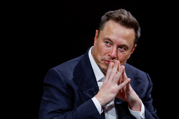 Elon Musk, CEO of SpaceX and Tesla and owner of Twitter, gestures as he attends the Viva Technology conference dedicated to innovation and start-ups at the Porte de Versailles exhibition center in Paris, on June 16, 2023.