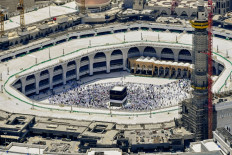 A handout photo released by the Saudi Press Agency (SPA) on June 25, 2023, shows an aerial view of the Kaaba, Islam's holiest site, at Mecca's Grand Mosque during the annual haj pilgrimage. 
