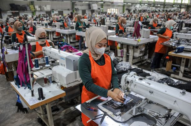 Workers produce backpacks on June 14, 2023, at the Katapang factory of PT Eksonindo Multi Product Industry (EMPI) in Bandung regency, West Java.