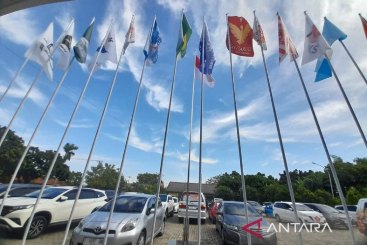 Flags of political parties participating in the 2024 election are seen in the parking lot of the office of the Bekasi General Elections Commission (KPU) in West Java in this undated photo.