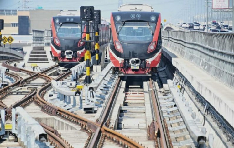 Two Greater Jakarta LRT trains are pictured in this undated photograph