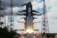 This screen grab made from video footage from ISRO via AFPTV taken on July 14, 2023, shows an Indian Space Research Organization (ISRO) rocket carrying the Chandrayaan-3 spacecraft lifting off from the Satish Dhawan Space Centre in Sriharikota, an island off the coast of southern Andhra Pradesh state. India on July 14, 2023, launched a rocket seeking to land an unmanned spacecraft on the surface of the Moon, a live feed showed, its second attempt to become only the fourth country to do so.