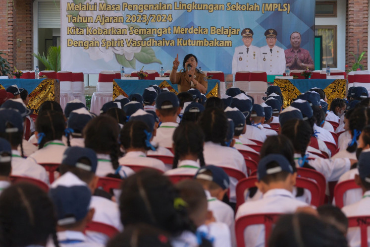 Role model: A teacher talks to new students during a school orientation program for 2023-2024 school year at SMP Negeri 14 junior high state school in Denpasar, Bali, on July 10, 2023. Antara/Nyoman Hendra Wibowo