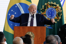 Brazilian Presiden Luiz Inacio Lula da Silva delivers a speech after signing a decree regulating the use of weapons in civilians in Brasilia, on July 21.