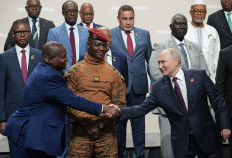 This pool image distributed by Sputnik agency shows Russian President Vladimir
Putin, African leaders and heads of delegations posing for a family photo at the second Russia-
Africa summit in Saint Petersburg on July 28, 2023.