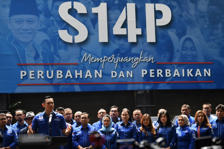 Democratic Party chairman Agus Harimurti Yudhoyono (left) addresses the press on Aug. 11, 2023, at the party’s headquarters in Menteng, Central Jakarta.