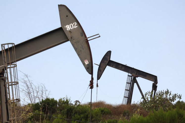 Oil pumpjacks operate on July 31, 2023, in Los Angeles, California, US.