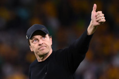 Australia's coach Tony Gustavsson greets supporters at the end of the Australia and New Zealand 2023 Women's World Cup quarter-final football match between Australia and France at Brisbane Stadium in Brisbane on August 12, 2023. 
