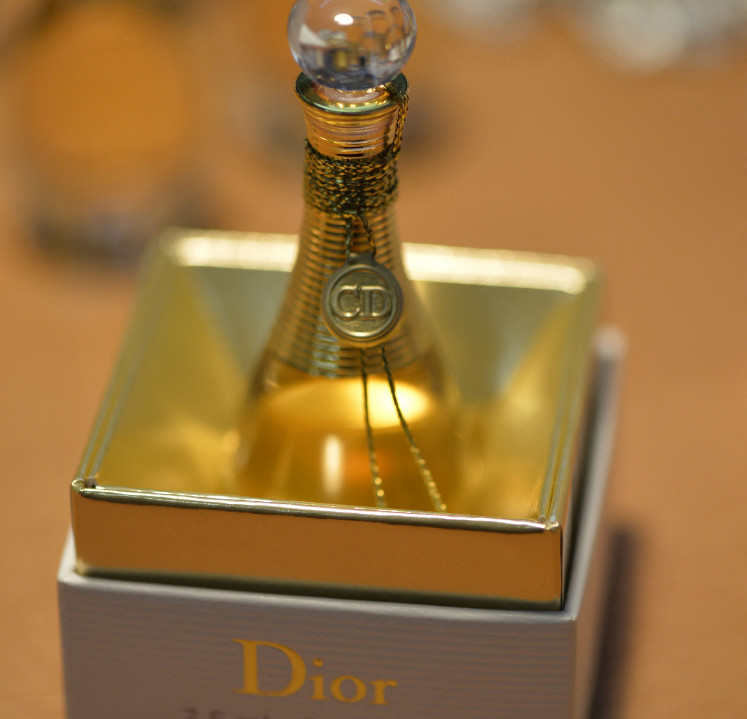 A bottle of Dior’s J'adore perfume is displayed on June 15, 2013, at the French luxury brand’s fragrance workshop in Paris.

