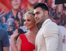 Britney Spears and Sam Asghari pose at the premiere of "Once Upon a Time In Hollywood" in Los Angeles, California, US, July 22, 2019. 