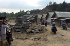 Workers are heading toward or back from the Morowali industrial complex in Bahodopi district, Morowali regency, Central Sulawesi, during a work shift change on around 3 p.m. on Oct. 18. As of October, the industrial estate claimed it had employed more than 15,000 local workers and around 2,500 Chinese workers