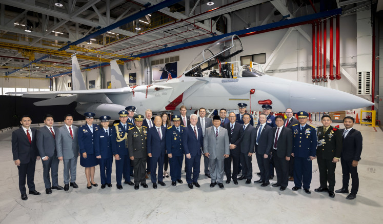 Major air power: Then-defense minister Prabowo Subianto (center) poses on Aug. 21, 2023, during a tour of the Boeing F-15EX production line at Boeing's facility in St. Louis, Missouri, the United States.