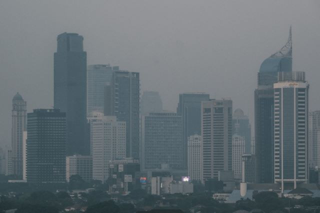 Haze resulting from air pollution blankets the Jakarta skyline on Aug. 23.
