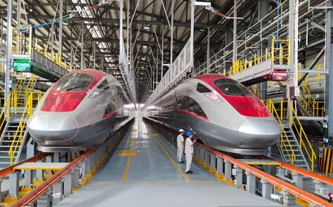 Technicians inspect high-speed trains of the Jakarta-Bandung HSR at the maintenance depot managed by railway operator PT Kereta Cepat Indonesia-China (KCIC) in Tegalluar, Bandung regency, West Java, in this file photo from August 2023.