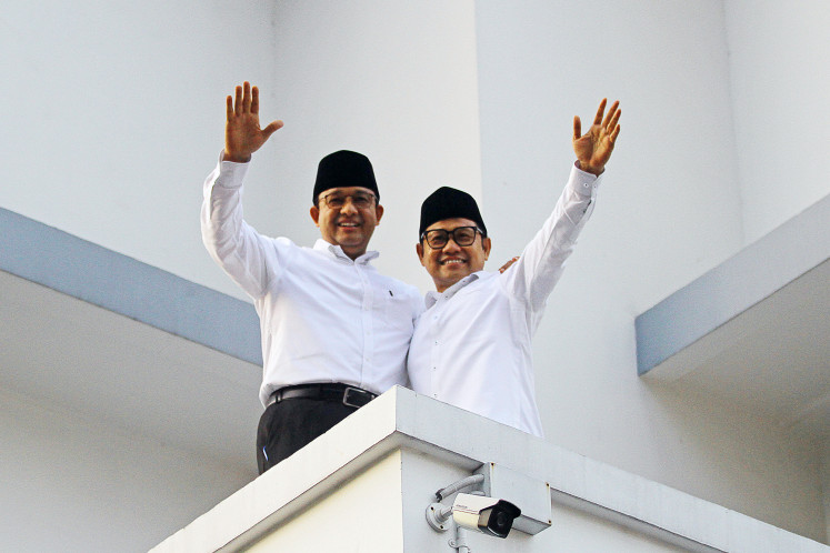 Presumptive presidential nominee Anies Baswedan (left) and running mate Muhaimin Iskandar pose on Sept. 2, 2023, for a photo in Surabaya, East Java, following the pair’s announcement that they would be running in next year's February election. 