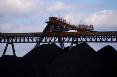 Coal is unloaded onto large piles at the Ulan Coal mines near the central New South Wales rural town of Mudgee in Australia, March 8, 2018. 