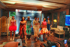 Models wear the creations of Indonesian fashion designers during a preview held in Jakarta ahead of New York Fashion Week, which runs from Sept 7 to 13 in New York City.