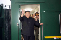 North Korean leader Kim Jong Un waves from a private train as he departs Pyongyang, North Korea, to visit Russia, September 10, 2023, in this image released by North Korea's Korean Central News Agency on September 12, 2023.  