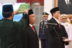 Jokowi installs new maritime security, quarantine agency chiefs